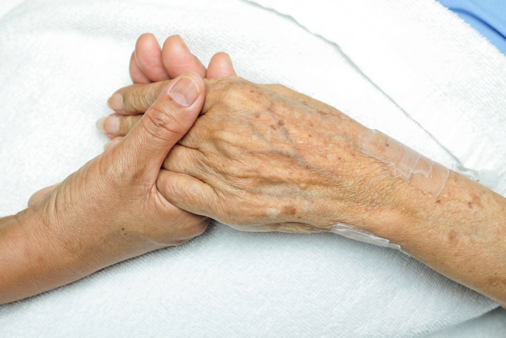 holding hands elderly